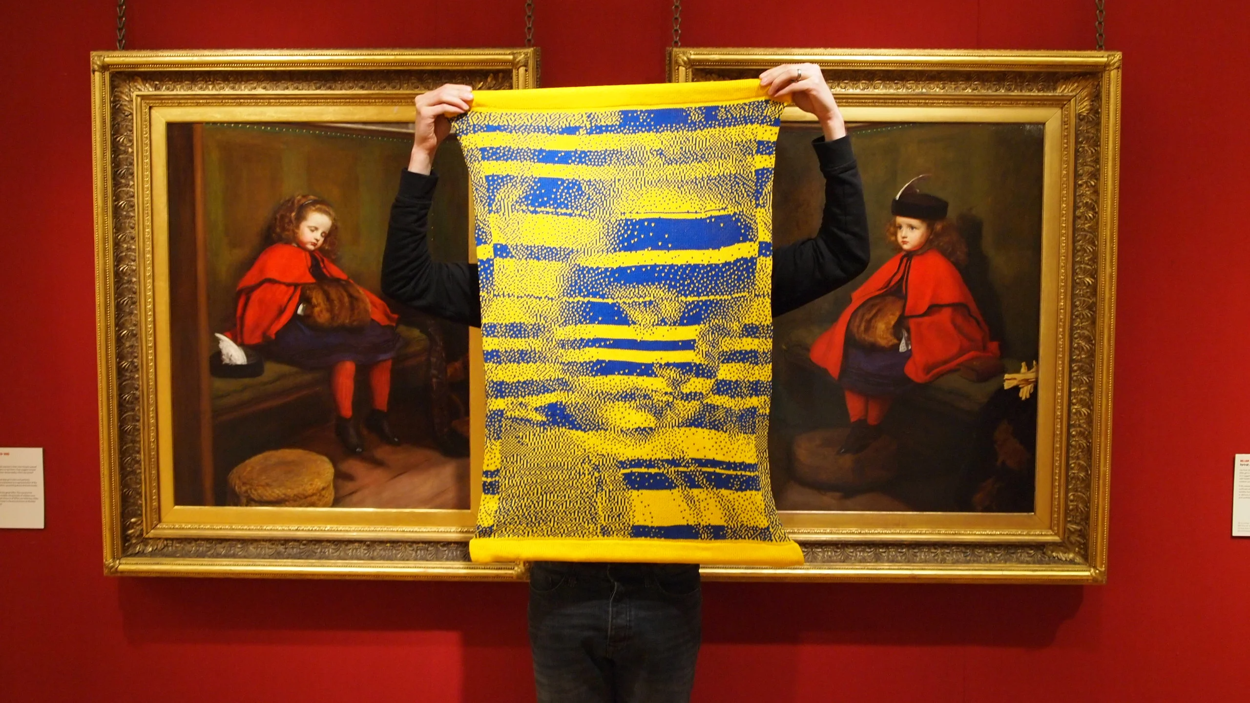 A re-knitsed image of the girl from Sir John Everett Millais's 'My second sermon', blocked out in yellow and blue according to the scores achieved by players throughout London Games Festival